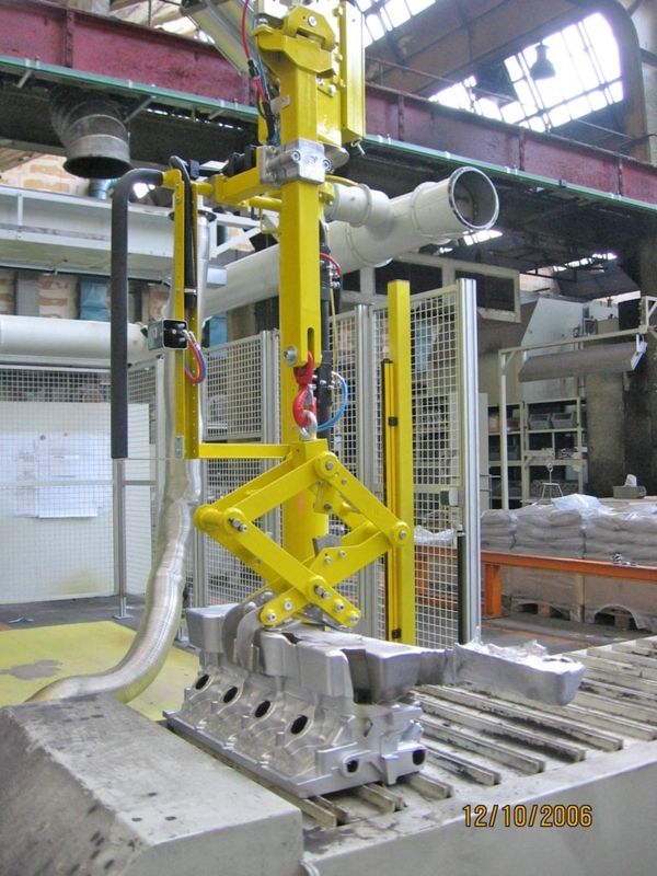 BMW motor foundry scissor gripper - Pneumatic Manipulator ATIS